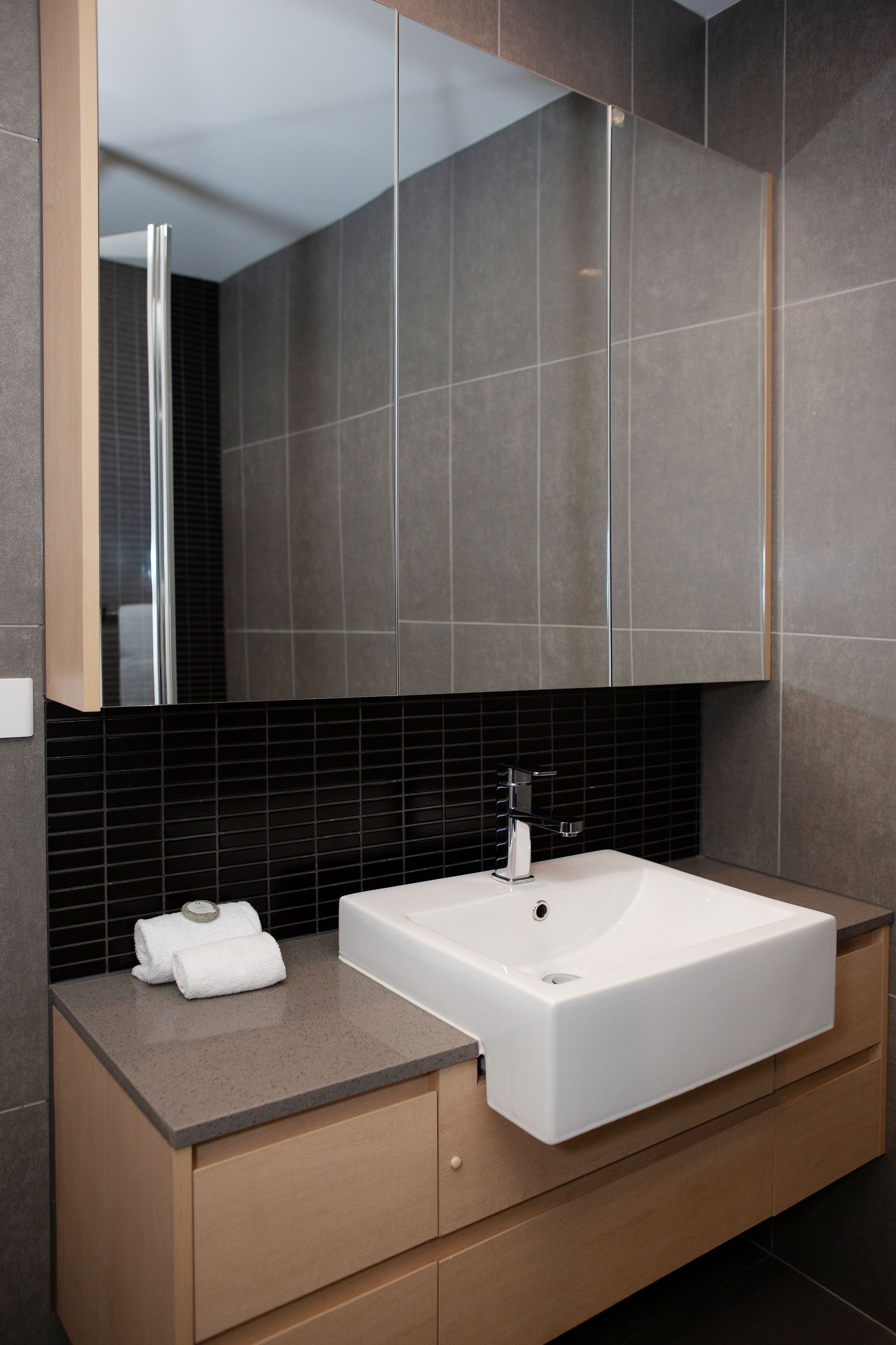 1 Bedroom Deluxe — king bedroom with sliding door