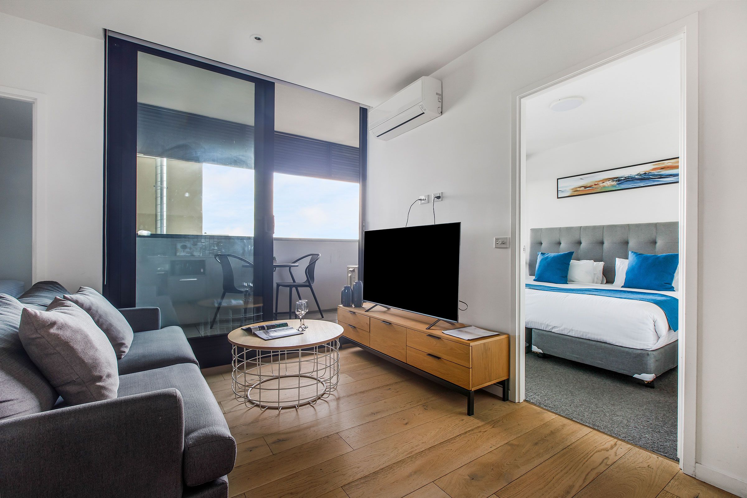 2 Bedroom Standard — lounge with balcony and bedroom